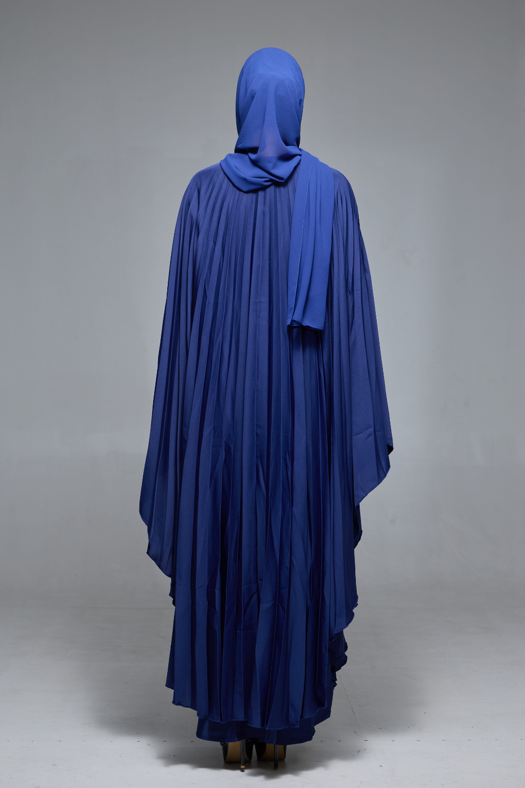 Delia Abaya in Navy