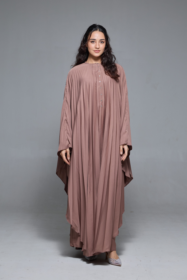 Delia Abaya in Brown
