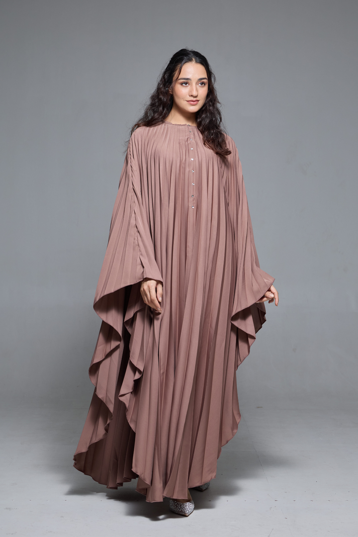 Delia Abaya in Brown