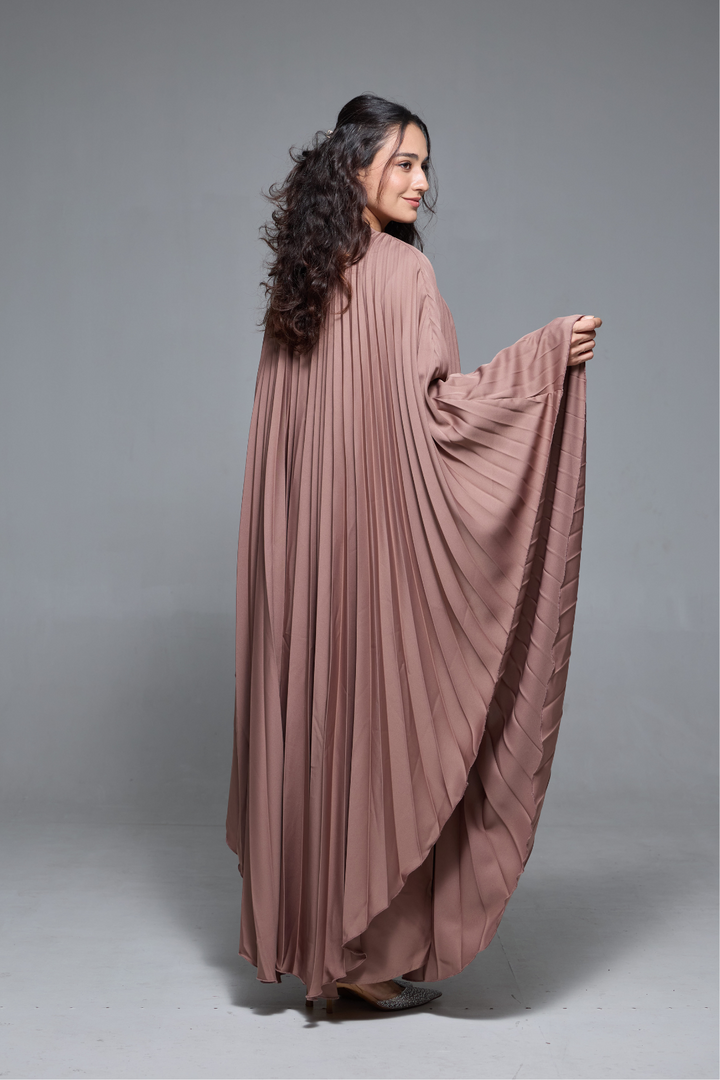 Delia Abaya in Brown