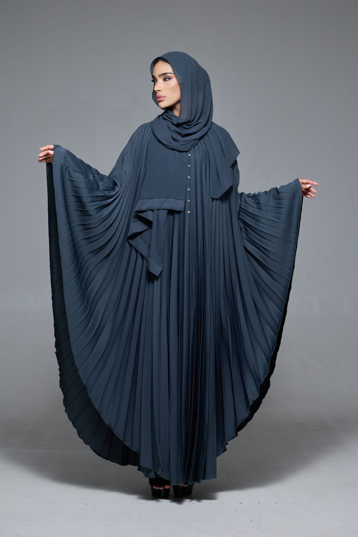 Delia Abaya in Dark Grey