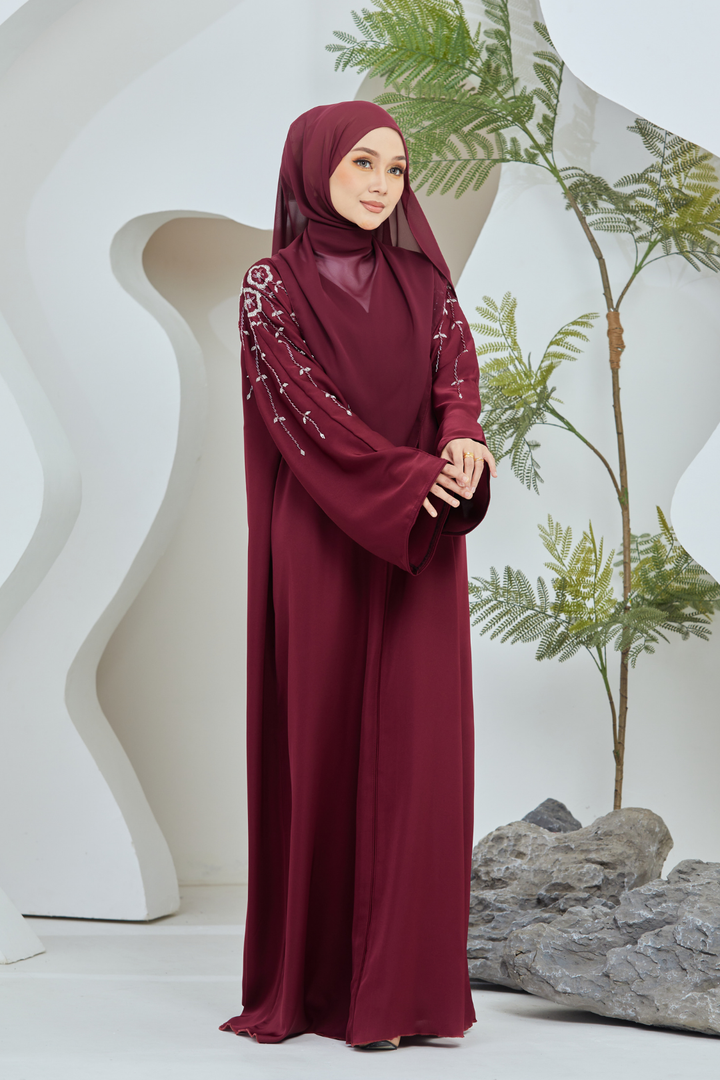 Muneera in Maroon