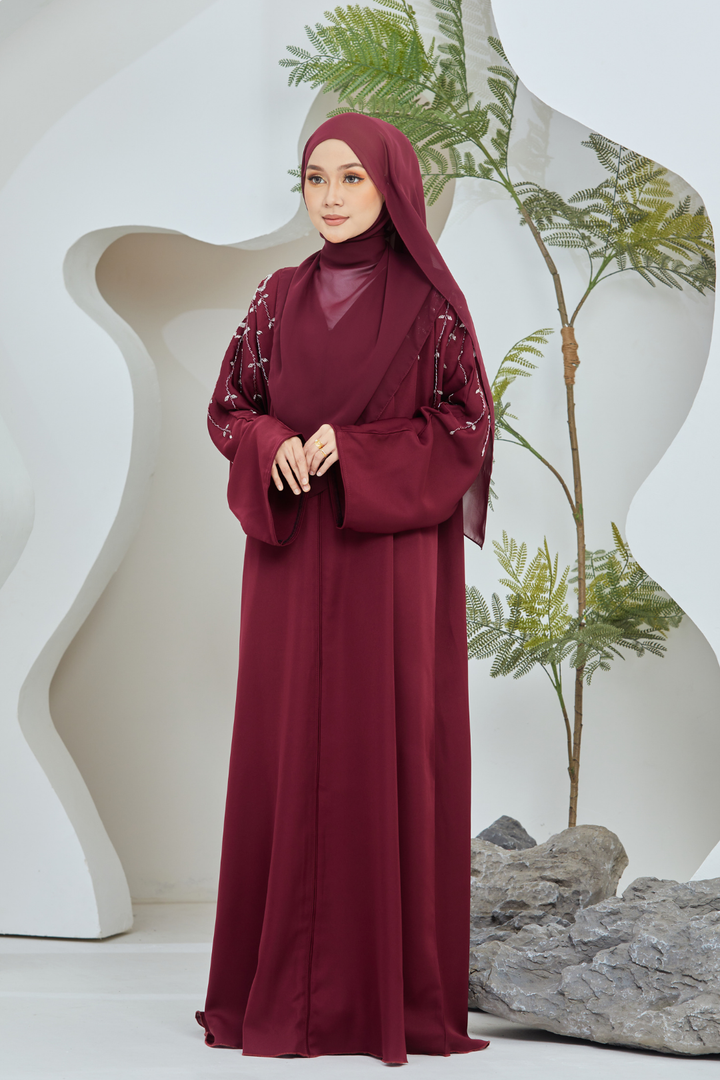 Muneera in Maroon