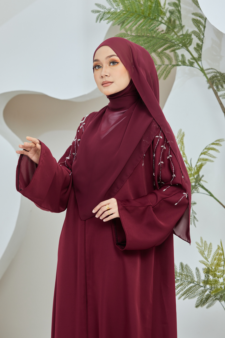 Muneera in Maroon