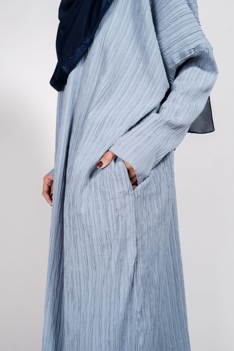 Singapore Muslimah model in batwing modest nursing-friendly kaftan with pockets