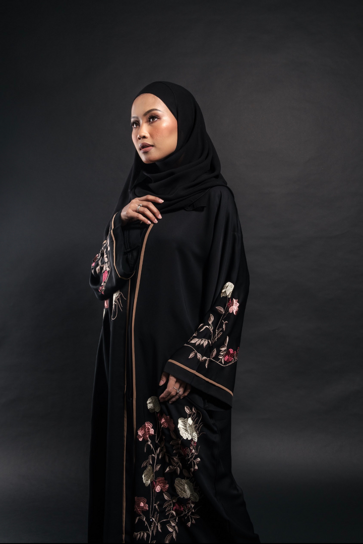 Singapore Muslimah model wearing embroidered black closed abaya in nidha with floral details