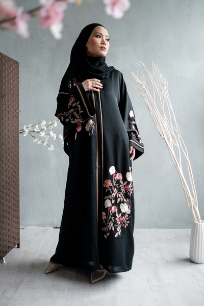 Singapore Muslimah model wearing embroidered black closed abaya in nidha with floral details