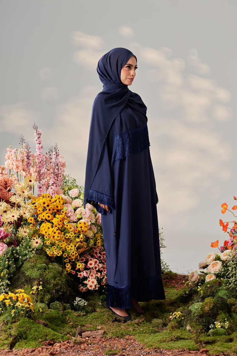 Malaysian model muslimah in nidha abaya with frills on sleeves and hem for Eid 2023