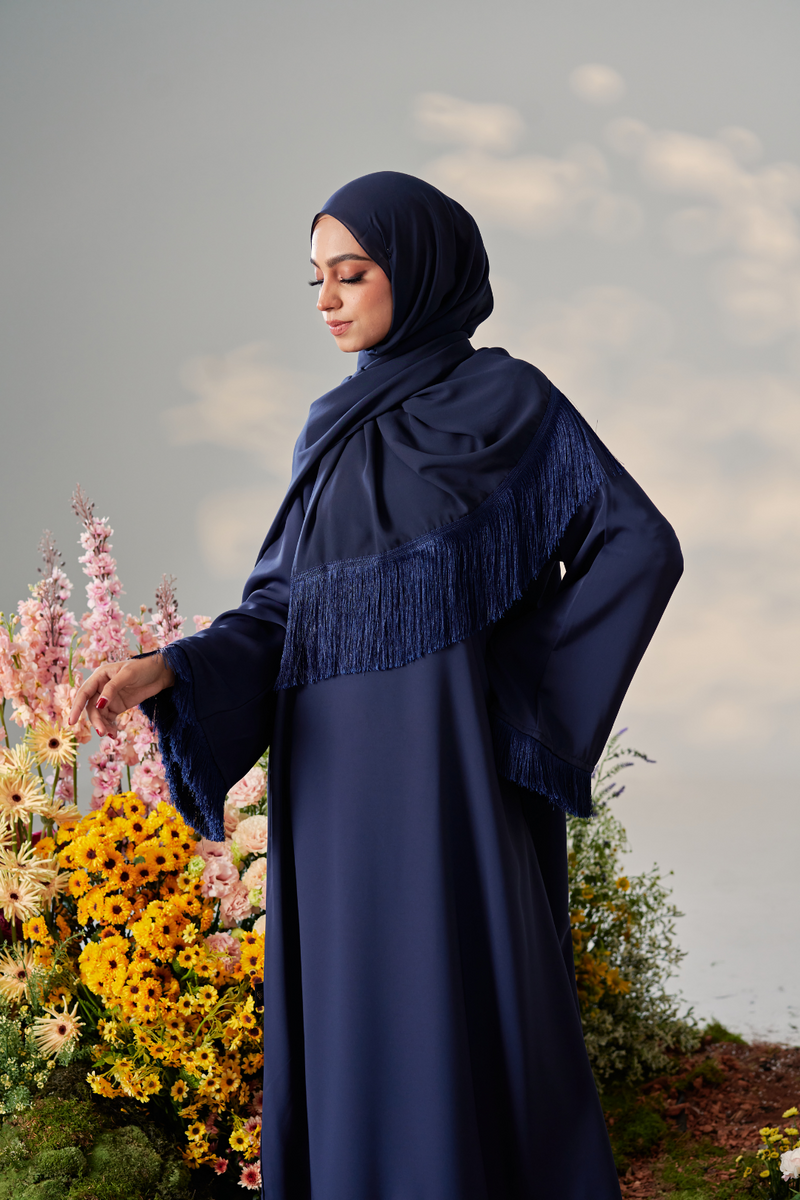 Malaysian model muslimah in nidha abaya with frills on sleeves and hem for Eid 2023