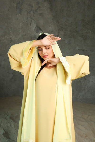 Dubai model muslimah in nidha abaya with frills on sleeves and hem