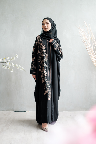 Lady in batwing nursing friendly flower embroidery abaya in black