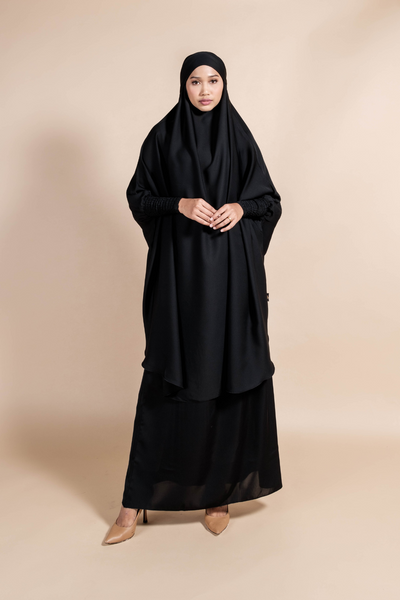 Muslimah model wearing nidha Jilbab with skirt in black
