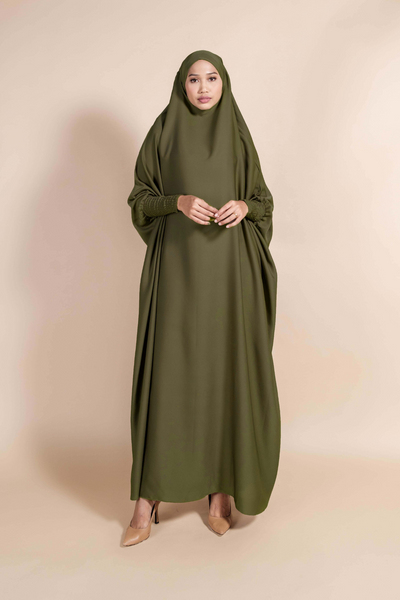 Muslimah model in Singapore wearing modest jilbab abaya